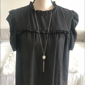 Polka dot blouse perfect for a little flare sz L